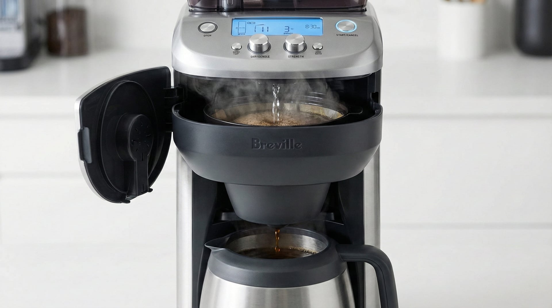 Precision brewing freshly ground coffee cascading through Breville Grind Control into thermal stainless steel carafe showing bloom function bean to cup extraction