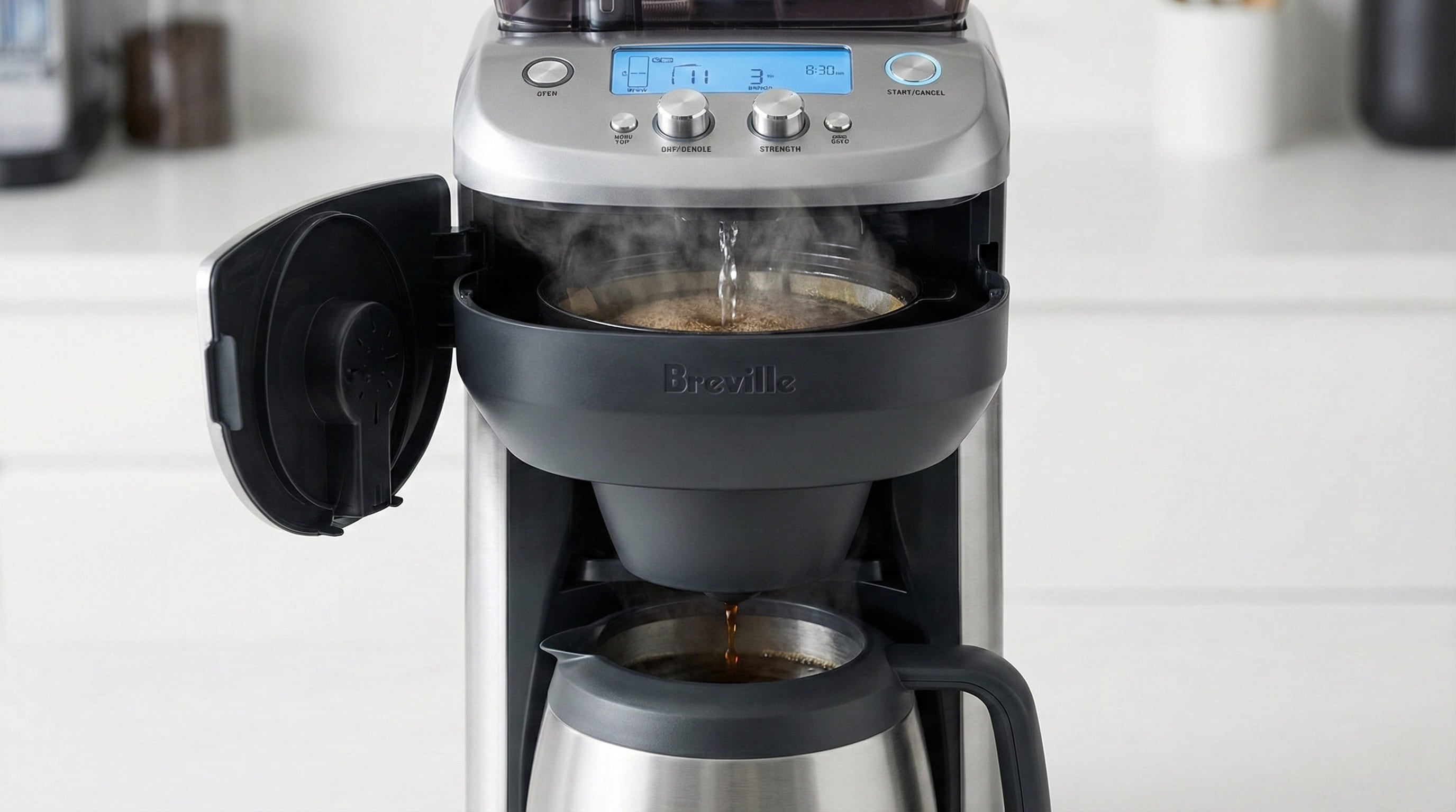 Precision brewing freshly ground coffee cascading through Breville Grind Control into thermal stainless steel carafe showing bloom function bean to cup extraction