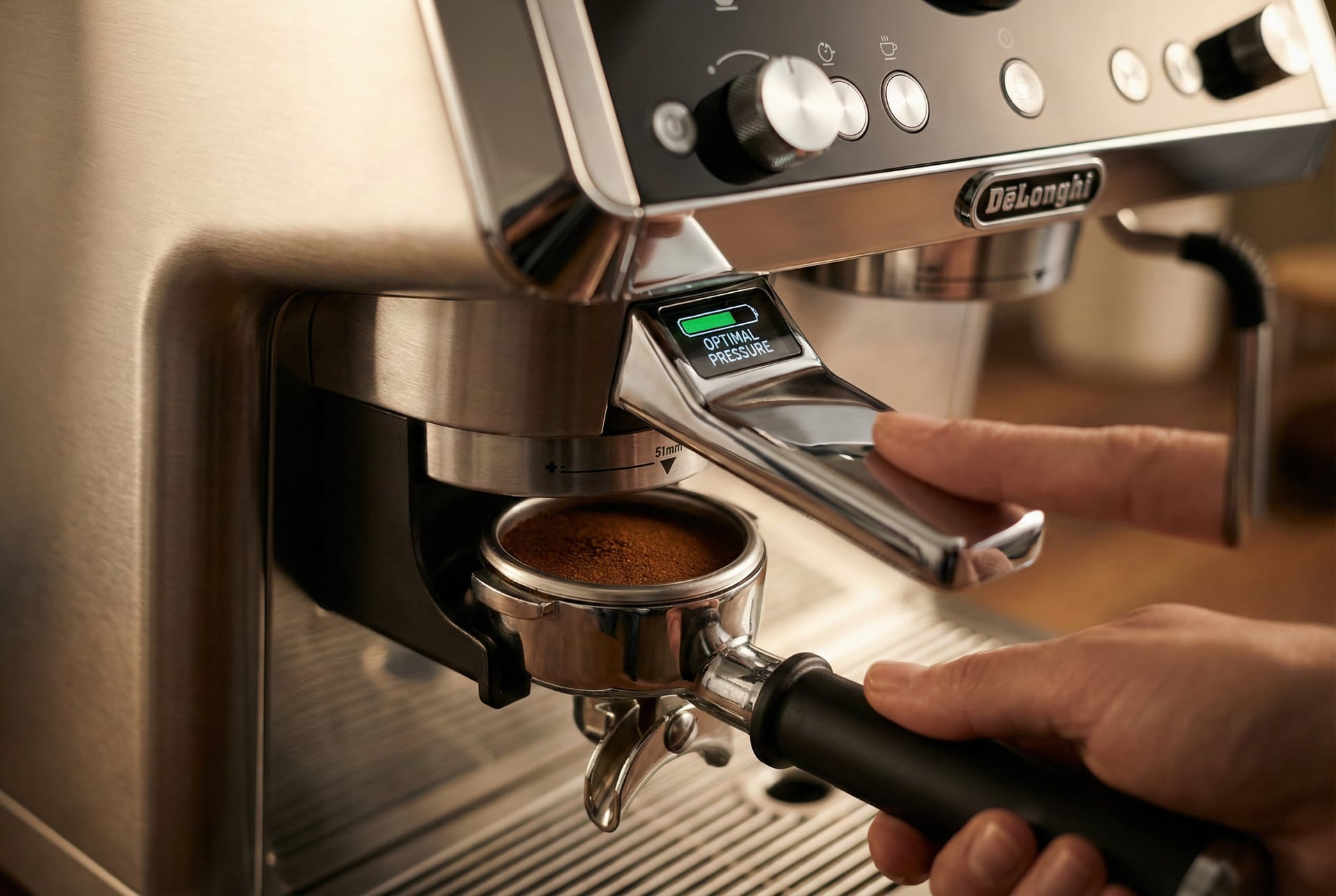 Smart Tamping Station with assisted leveling creating consistent 30lb pressure pucks for sensor grinding system