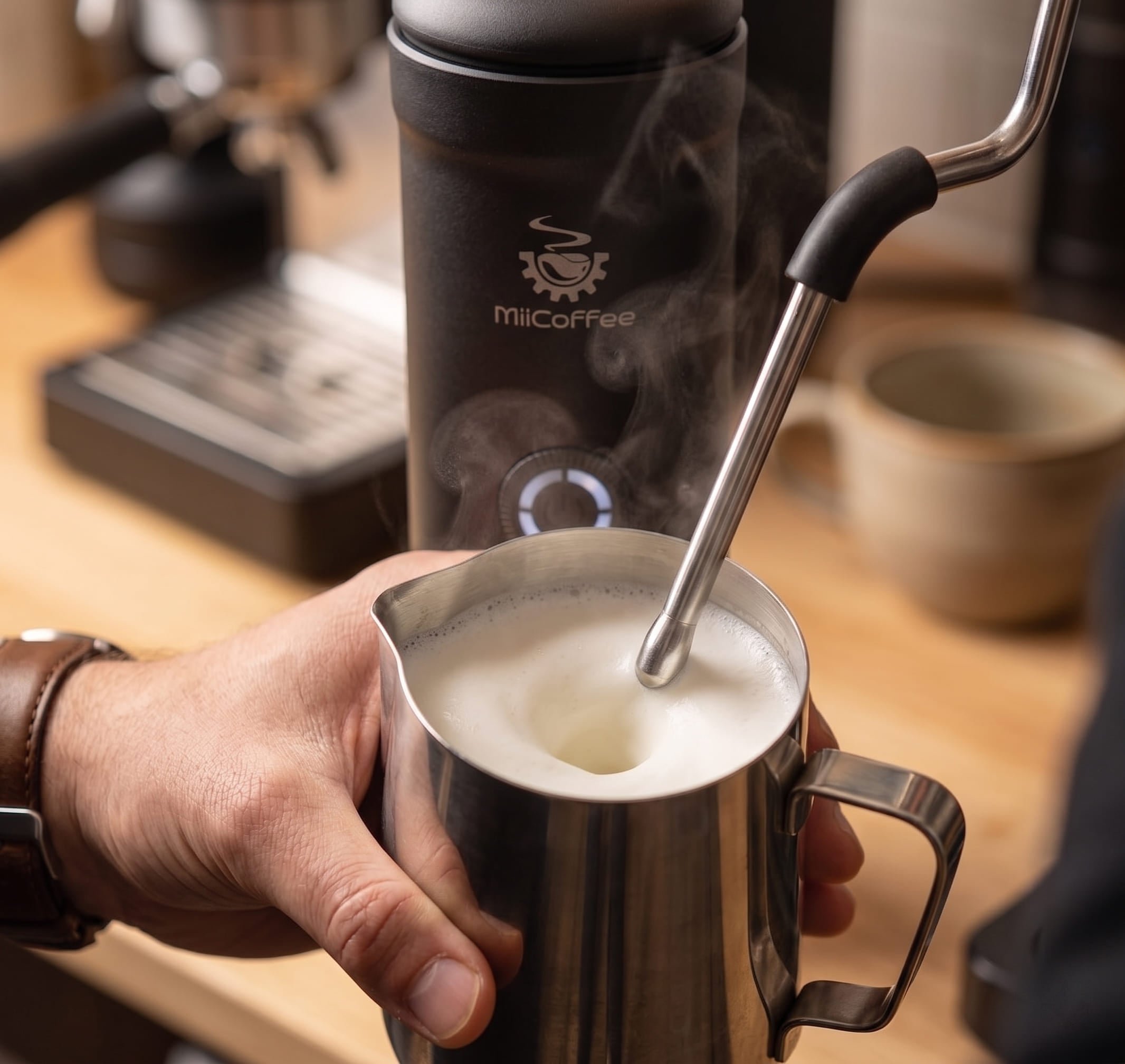 MiiCoffee Eon steam wand producing silky microfoam for latte art from compact espresso machine