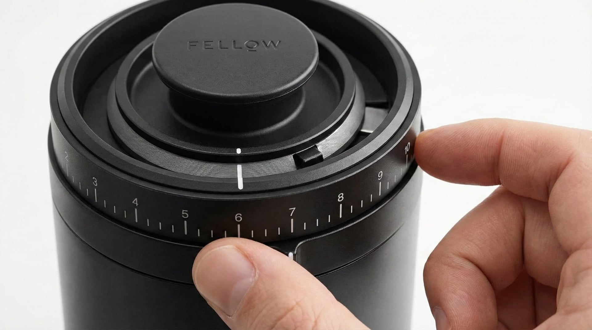 Fellow Opus versatile grinder 41 grind settings dial showing stepped adjustment from fine espresso to coarse French press on budget all-purpose conical burr grinder