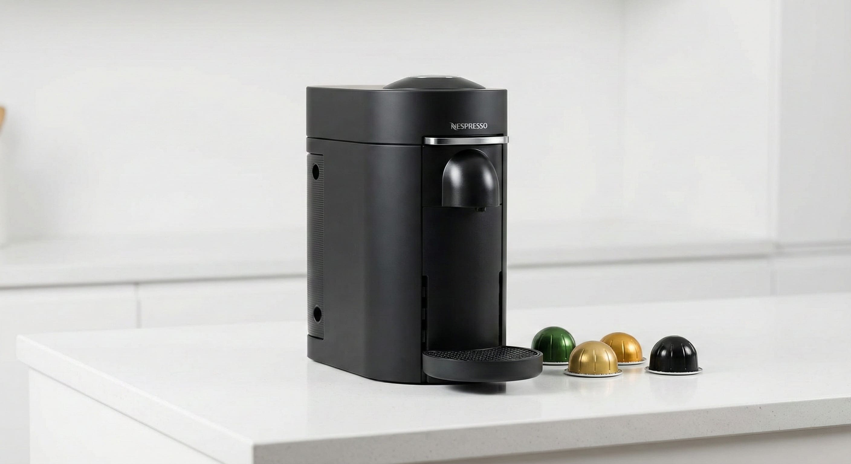 Nespresso VertuoPlus pod coffee maker with Centrifusion extraction technology, one-touch brewing with barcode capsule recognition, and automatic used capsule ejection
