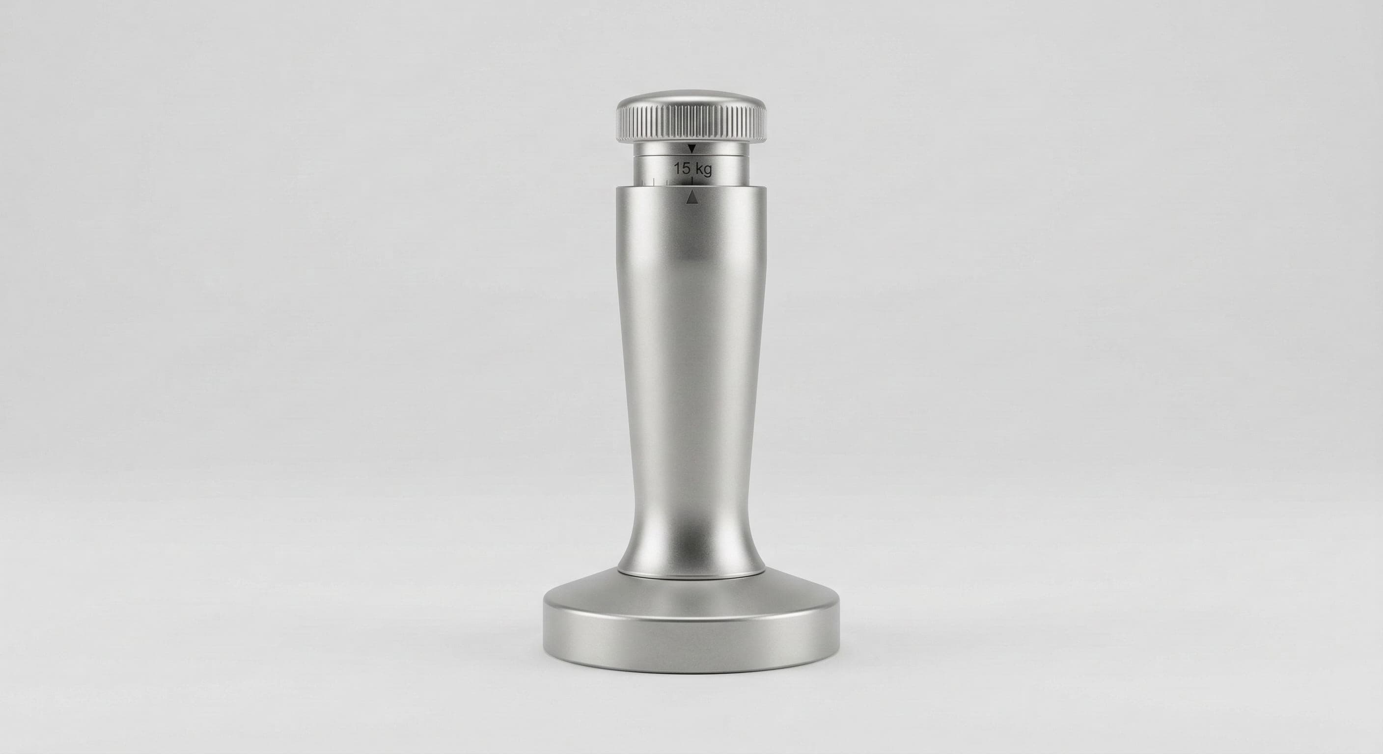 Spring-loaded calibrated espresso tamper with visible pressure mechanism — self-calibrating tamper set to 15 kg for consistent espresso tamping pressure