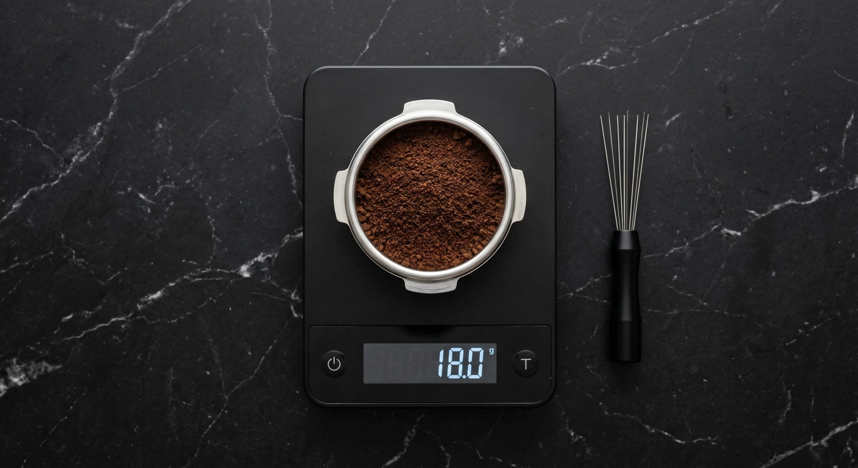 Portafilter basket on a precision digital scale showing 18.0 g dose of freshly ground espresso coffee — correct dose measurement for espresso dial-in