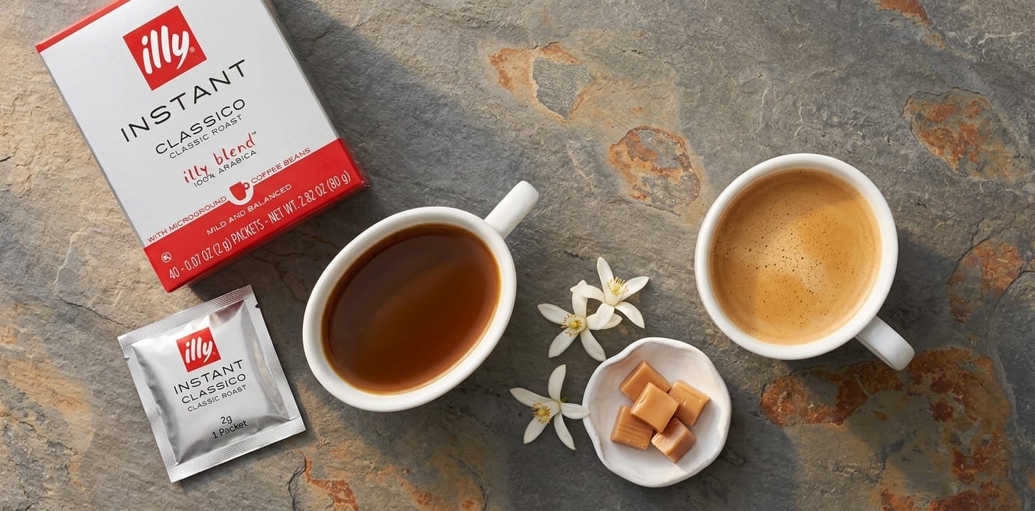 illy Classico espresso crema top-down view showing smooth uniform hazel-gold Arabica crema in white cup