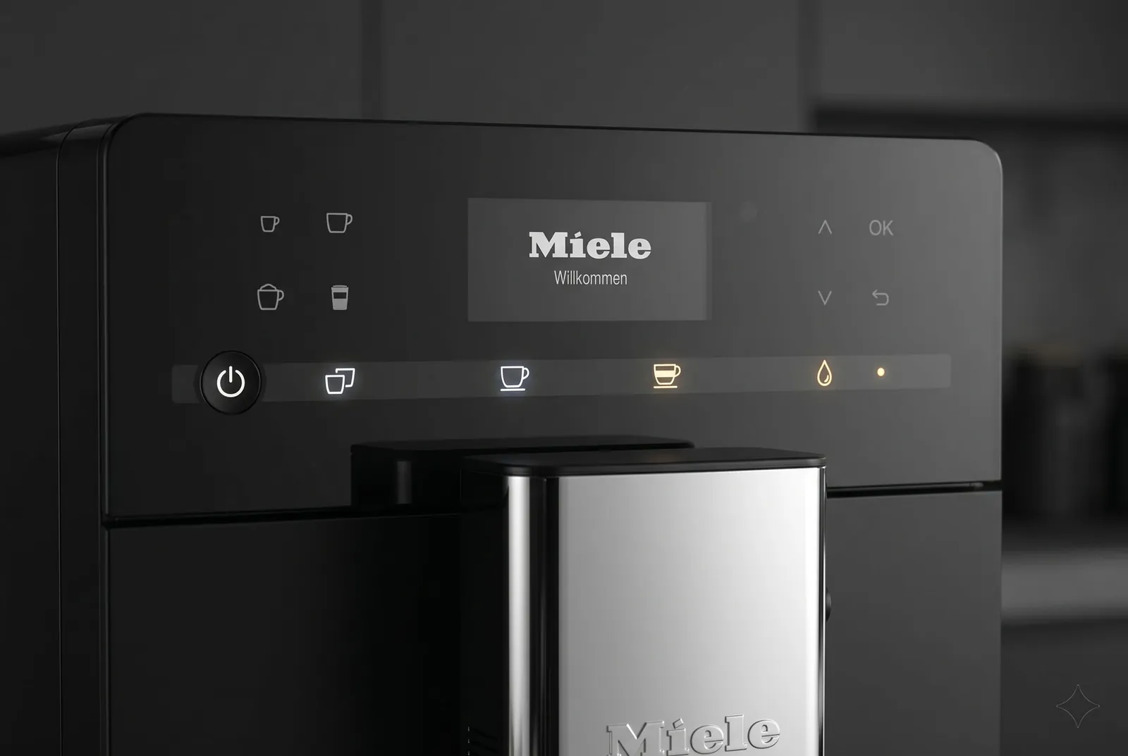 Miele CM 5310 Silence touch control panel with a small display reading Willkommen and a row of drink and setting icons