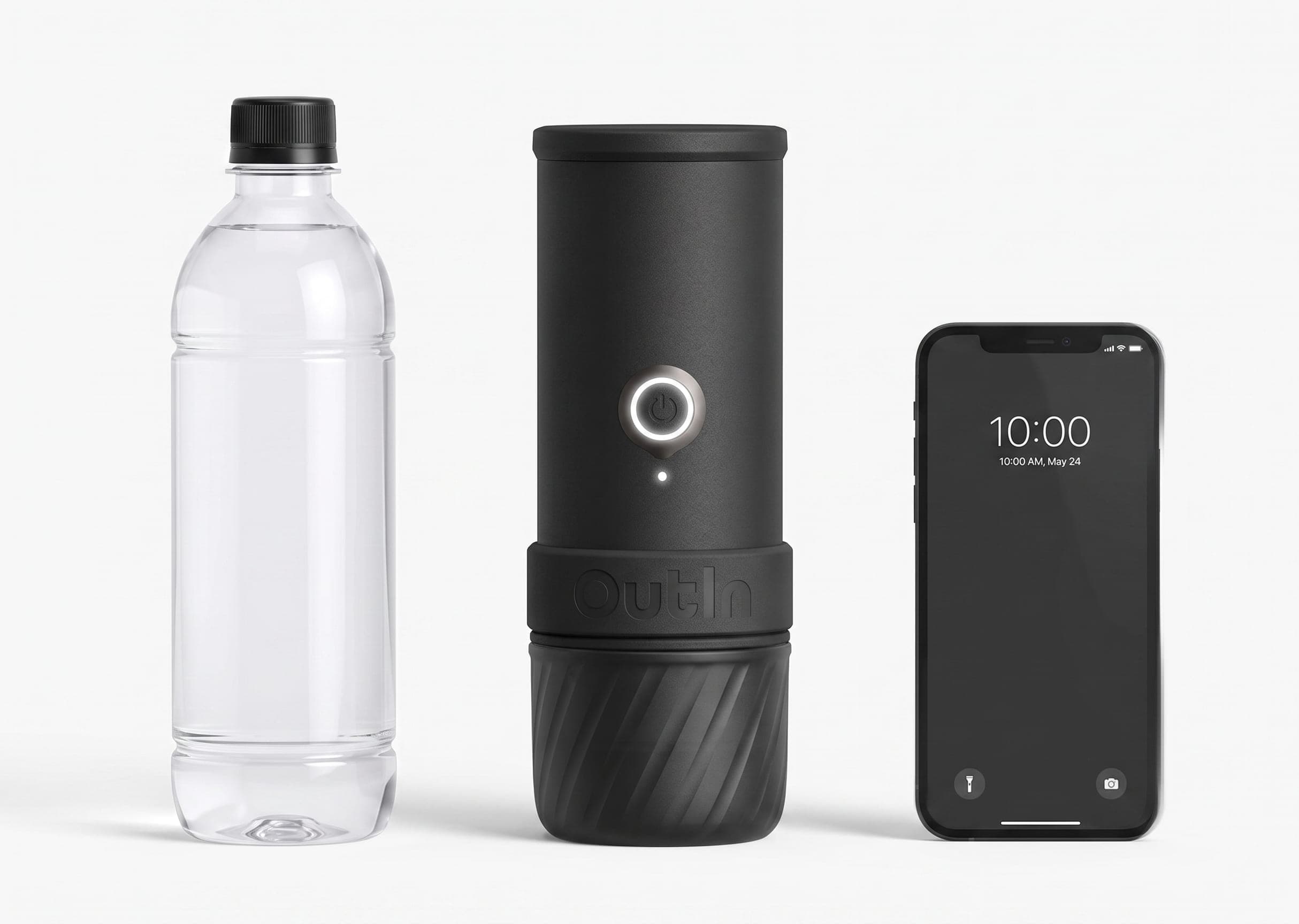 Outin Mino portable coffee maker standing beside a water bottle and a smartphone for scale