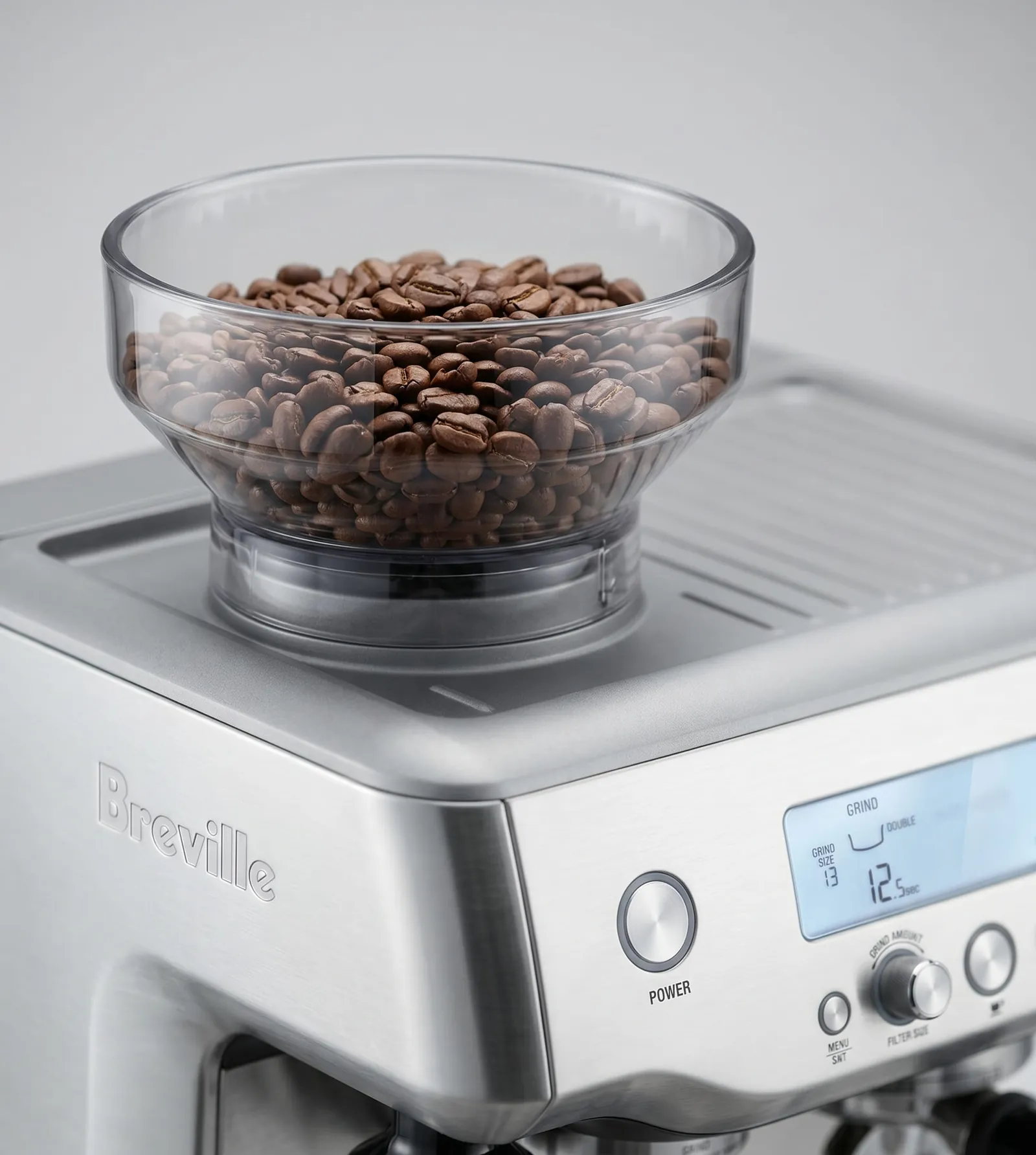 Breville Barista Pro integrated conical burr grinder and bean hopper shown up close