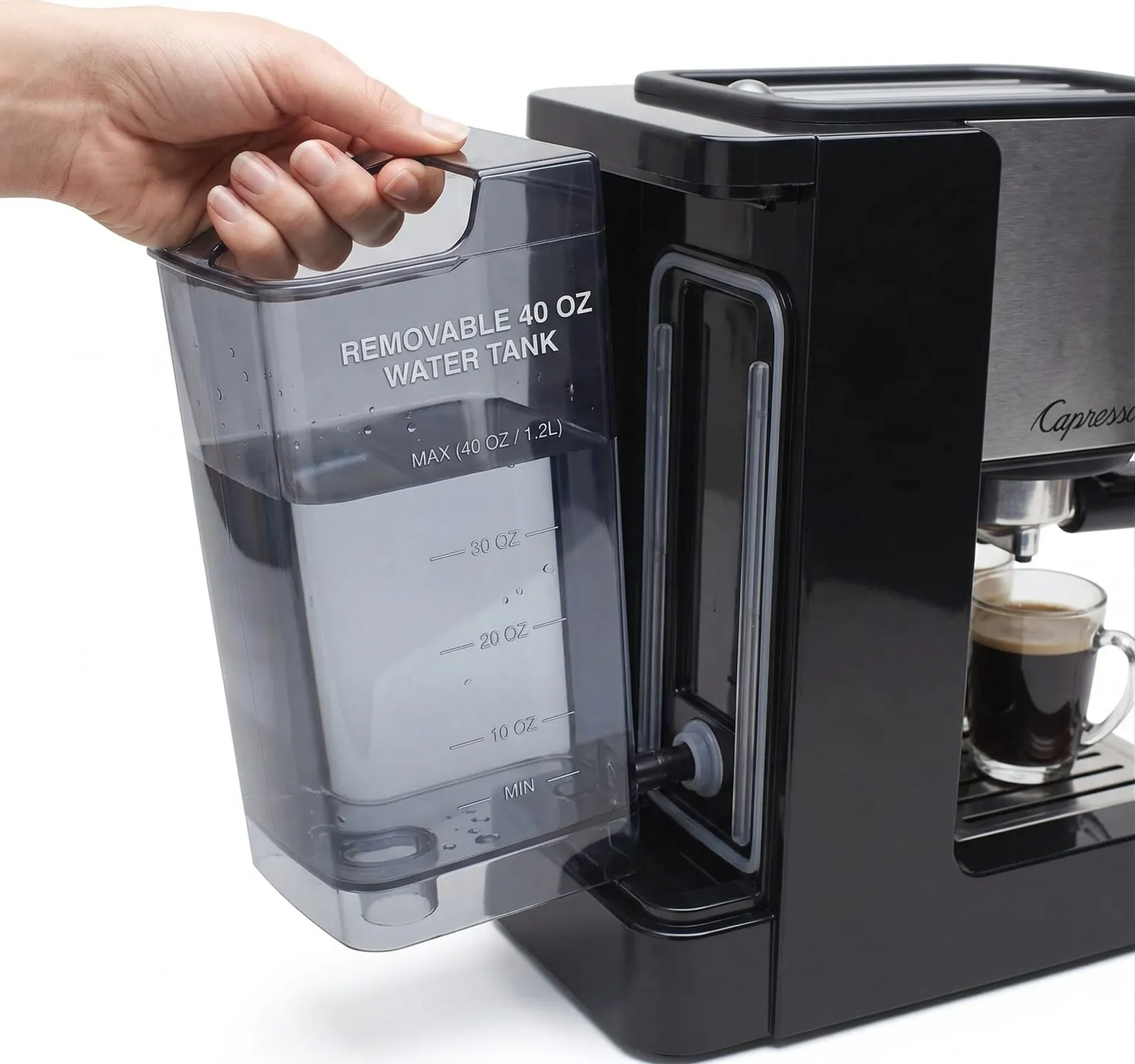 Capresso EC100 removable water tank lifted out from the back of the machine