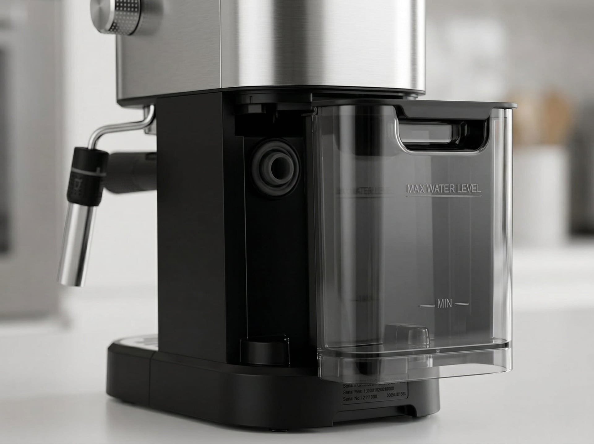 Krups XP444C50 34 oz removable water tank detail showing fill line and easy-remove design for budget espresso machine