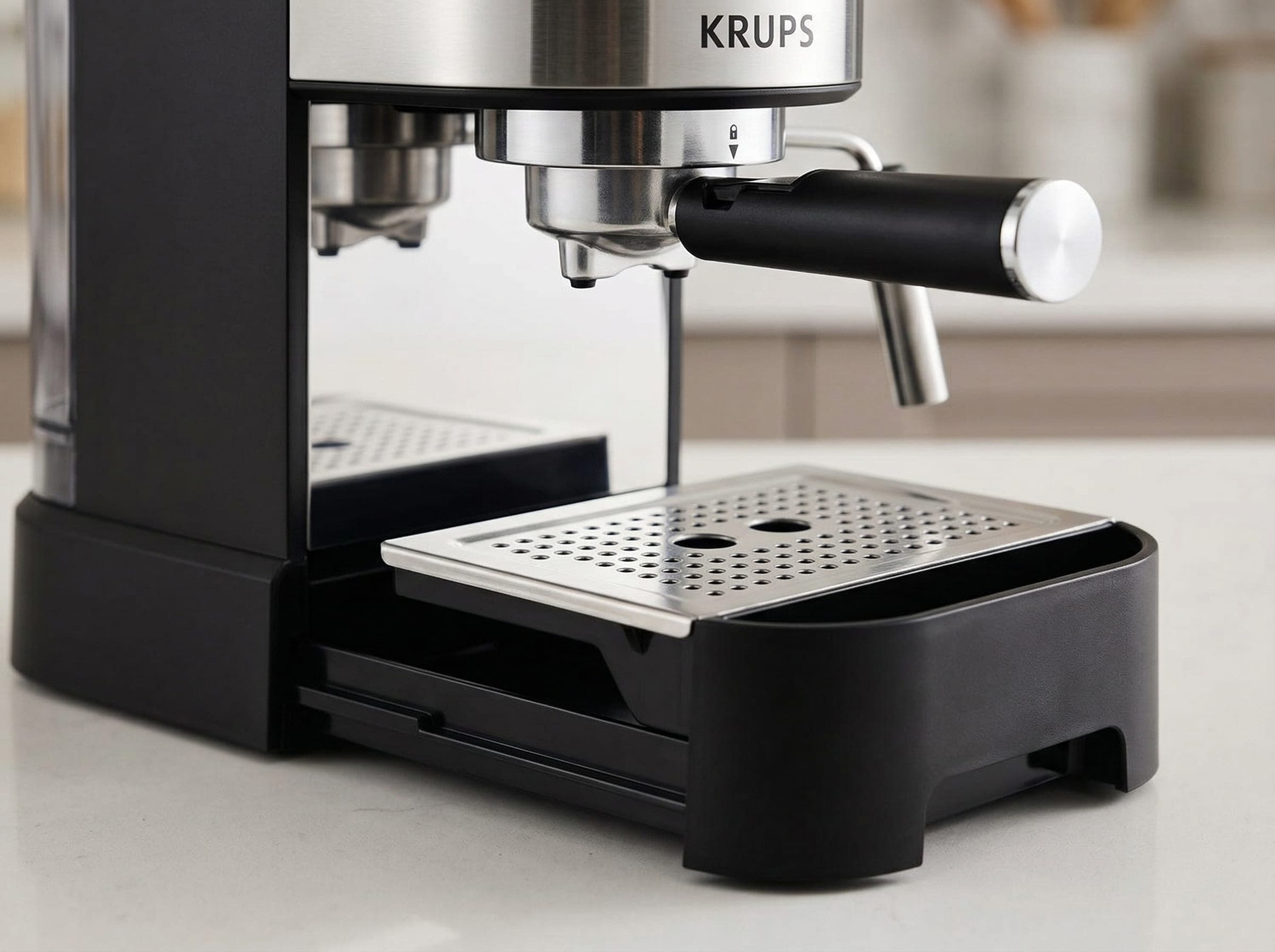Krups XP444C50 removable drip tray and cup warming plate on top of the machine