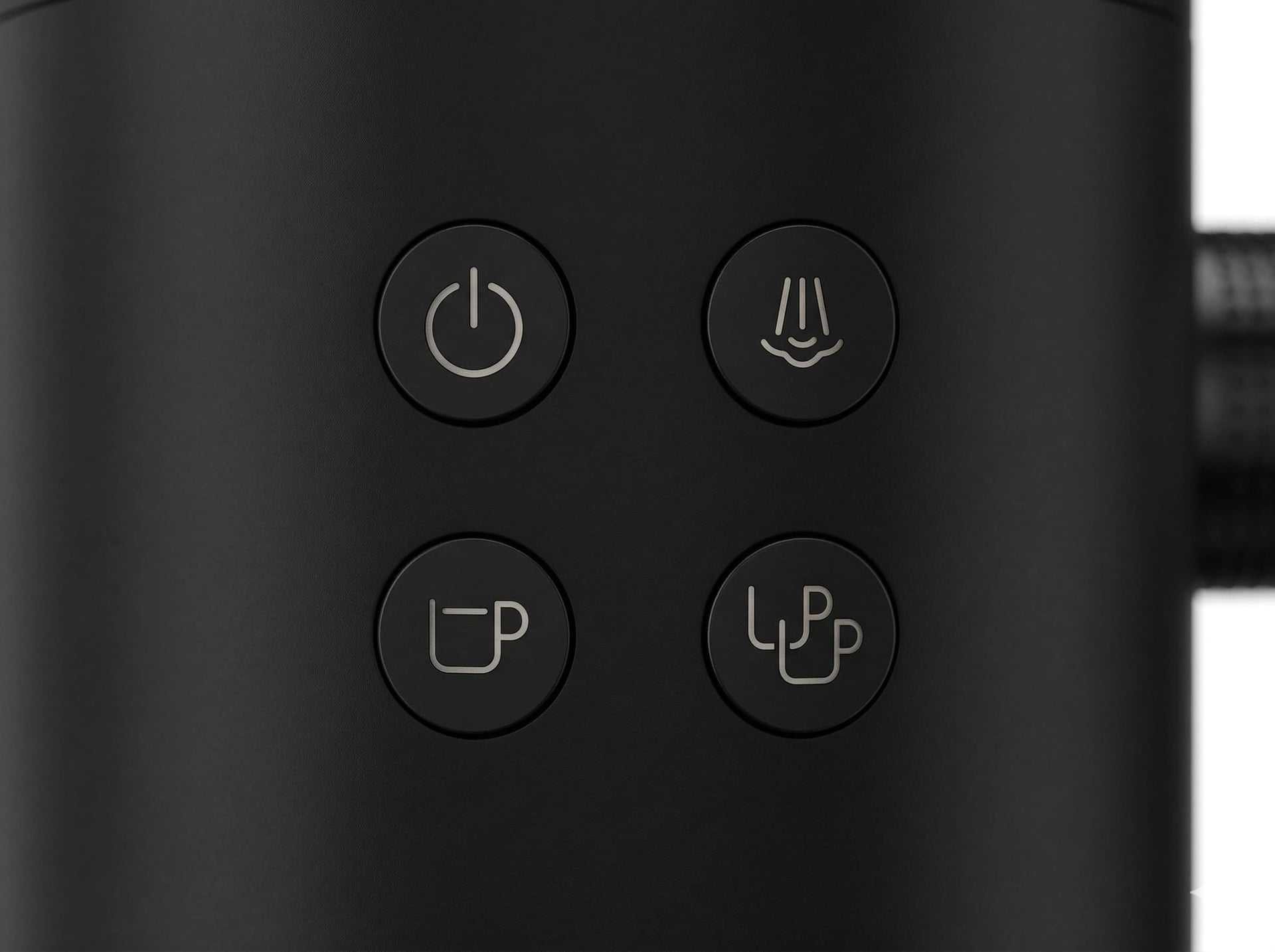 Krups XP444C50 controls panel closeup showing simple one-touch buttons for espresso and steam on entry level machine