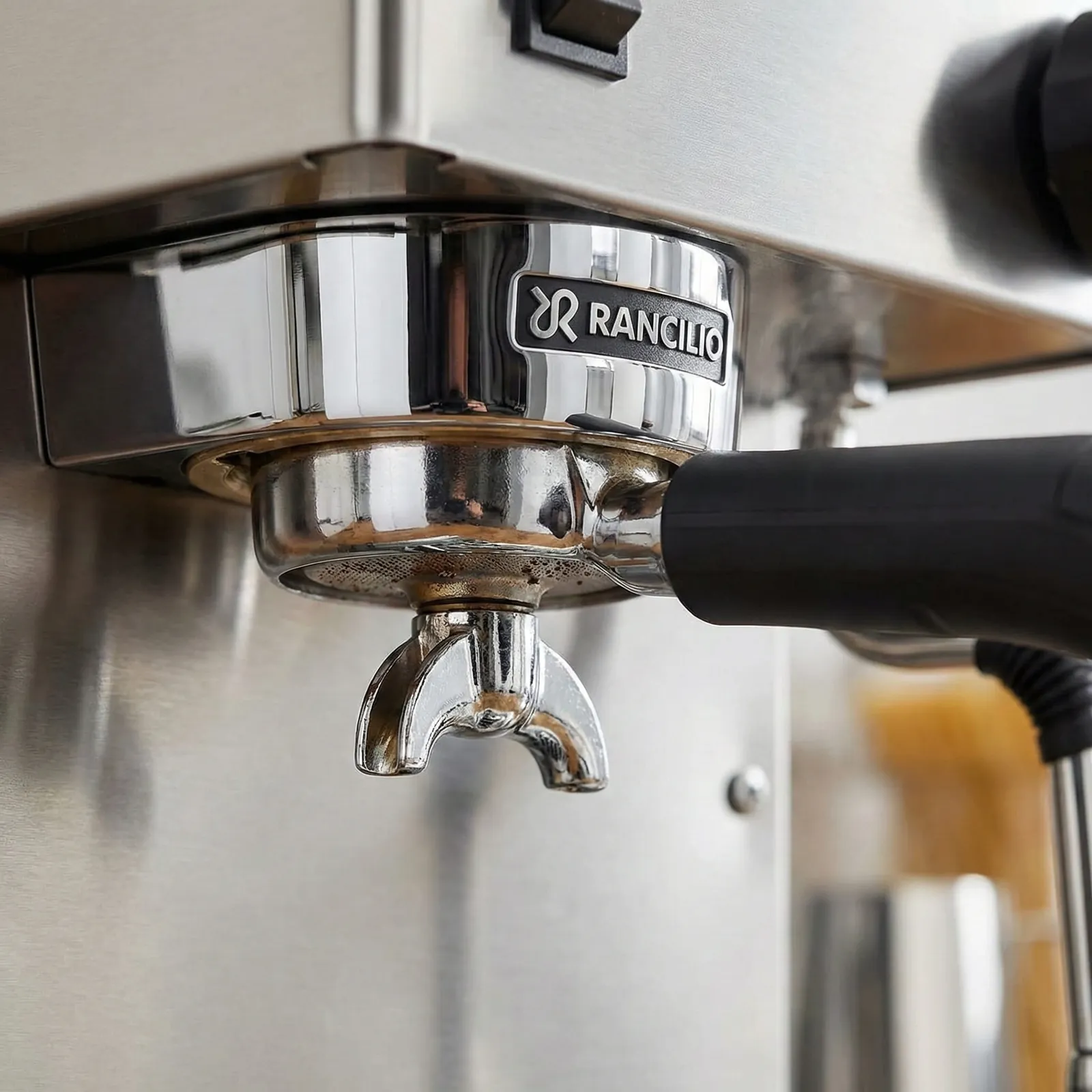 Rancilio Silvia commercial-style group head with brass construction up close