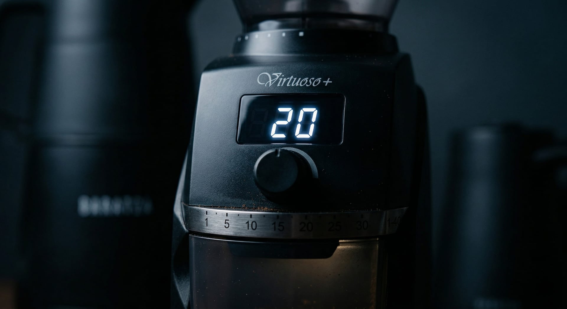 Baratza Virtuoso+ backlit digital timer display showing timed dosing feature for repeatable grind weight — home barista workflow