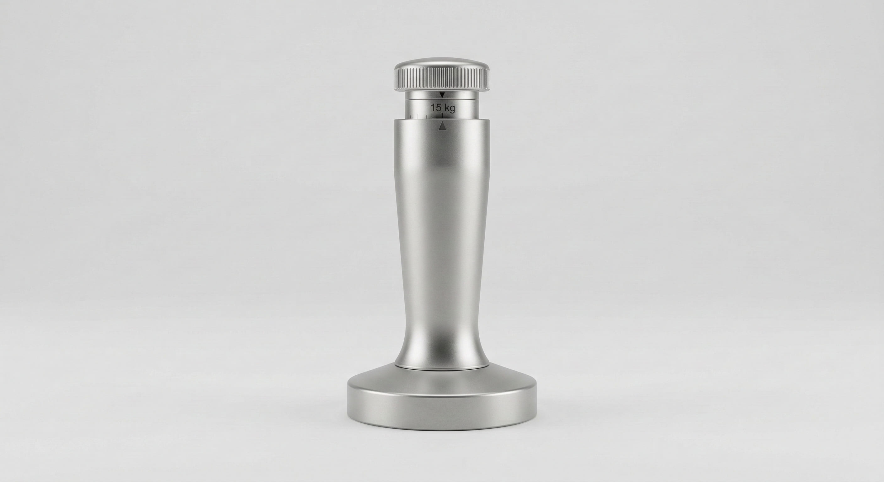 Spring-loaded calibrated espresso tamper with visible pressure mechanism — self-calibrating tamper set to 15 kg for consistent espresso tamping pressure