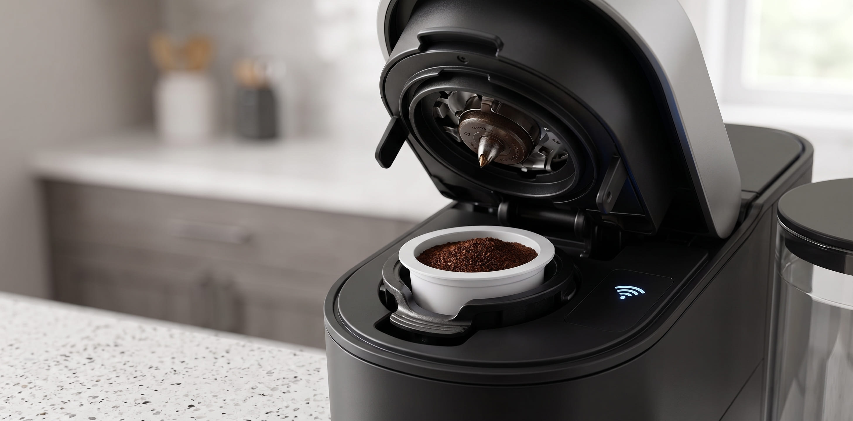 Close-up of K-Cup pod insertion mechanism showing universal compatibility with popular coffee brands