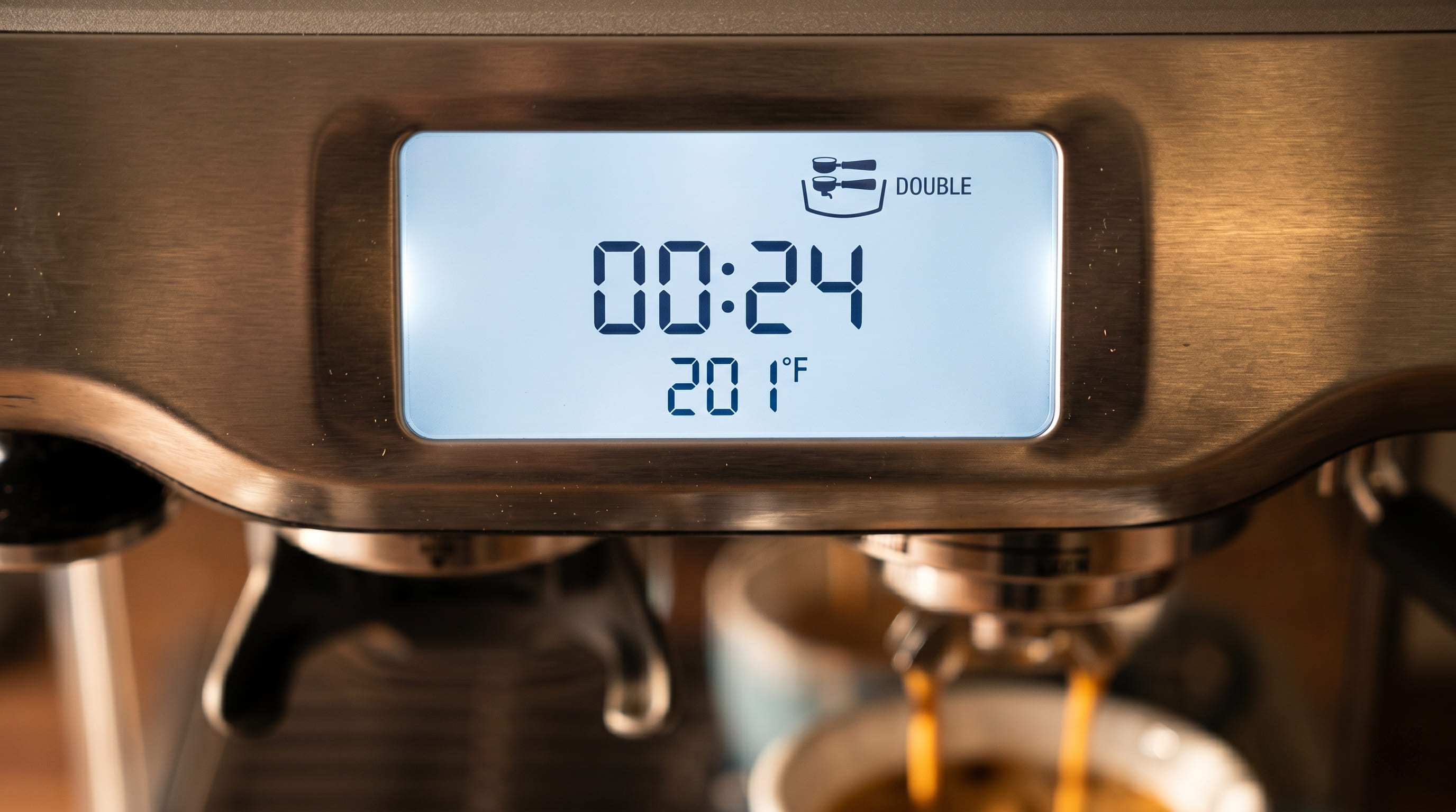 Breville Barista Pro digital display showing real-time shot timer, temperature readout, and grind amount during espresso extraction