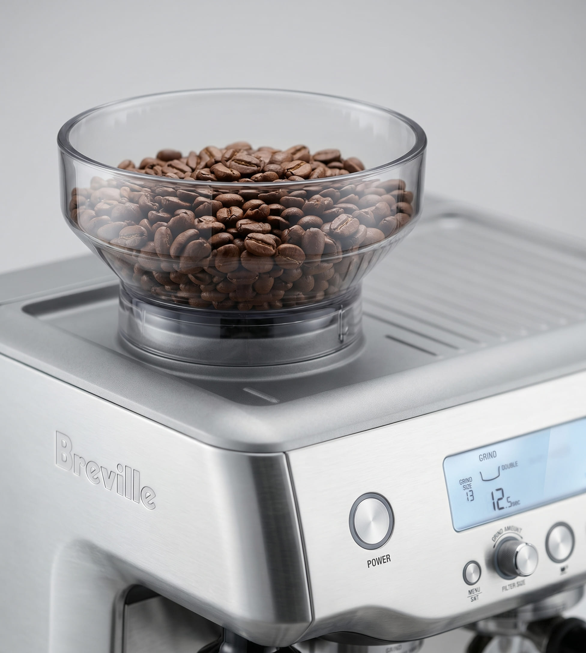 Breville Barista Pro 30-setting integrated conical burr grinder close-up with dose control knob and bean hopper