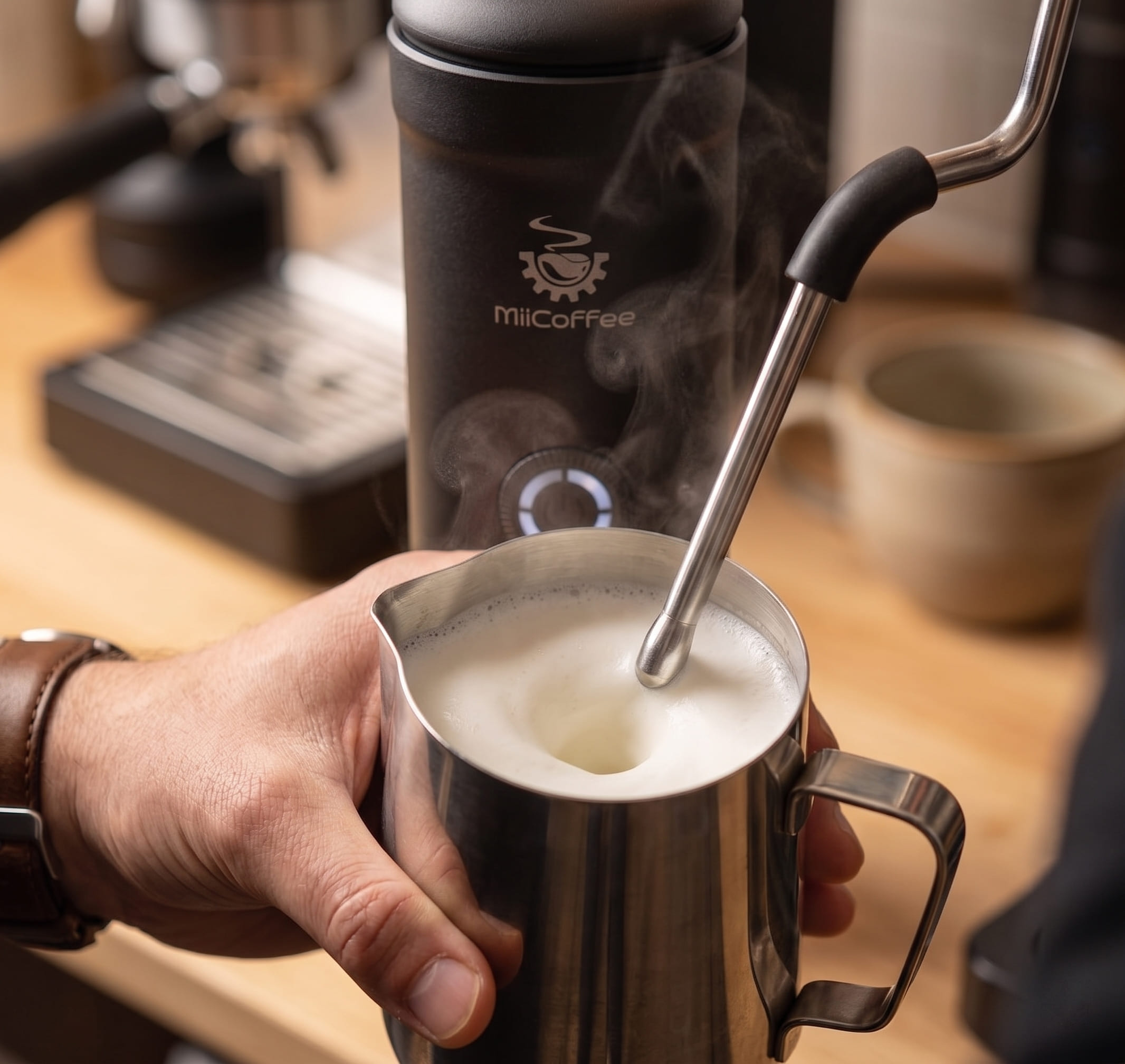 MiiCoffee Eon steam wand producing silky microfoam for latte art from compact espresso machine