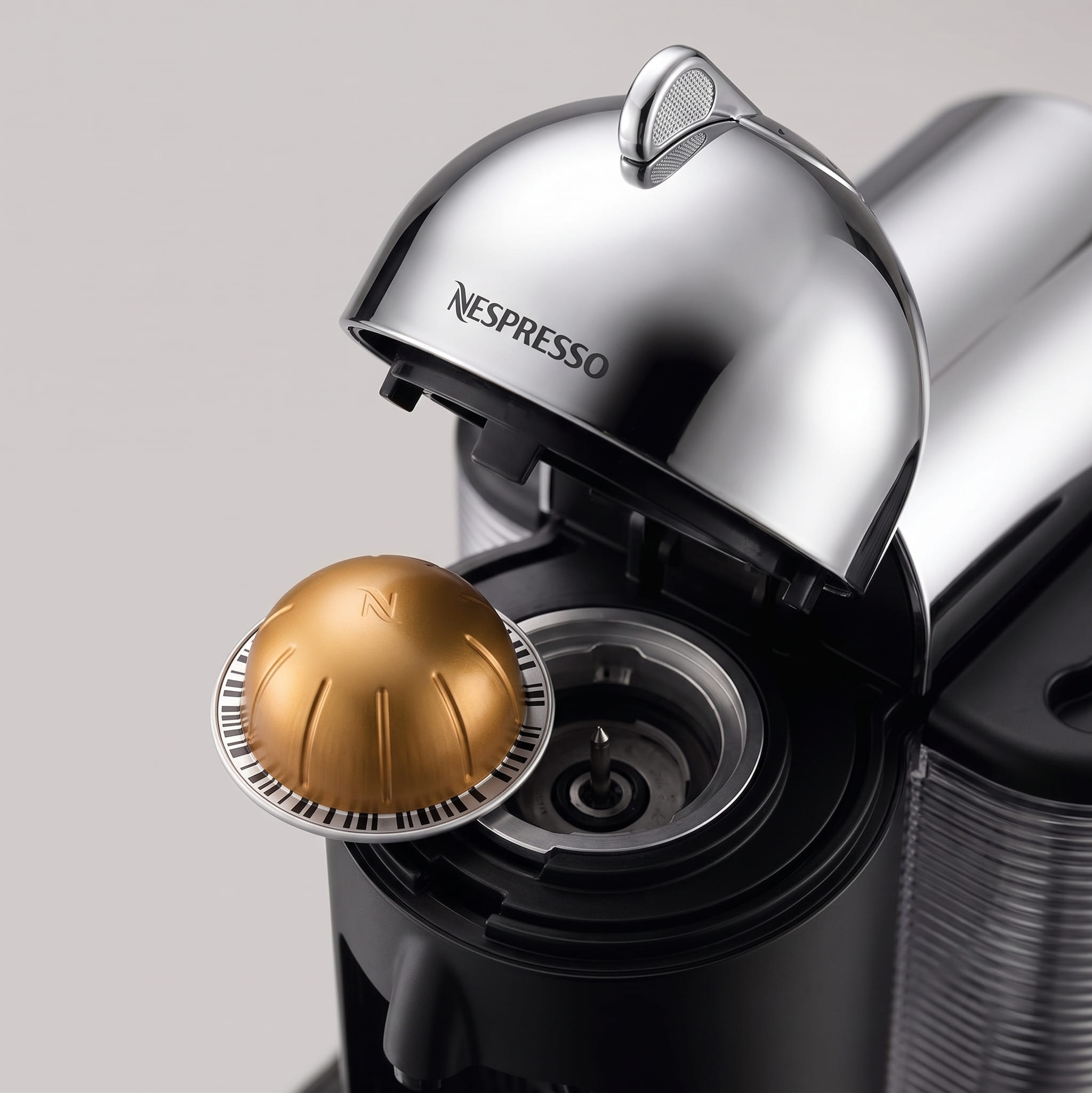 Nespresso Vertuo barcode capsule system showing automatic parameter reading for perfect extraction every brew
