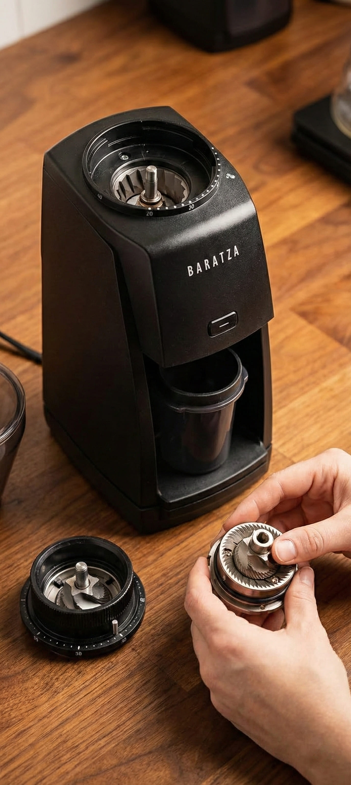 User-serviceable design of Baratza Encore ESP grinder showing accessible burr chamber and repair-friendly construction for long-term ownership