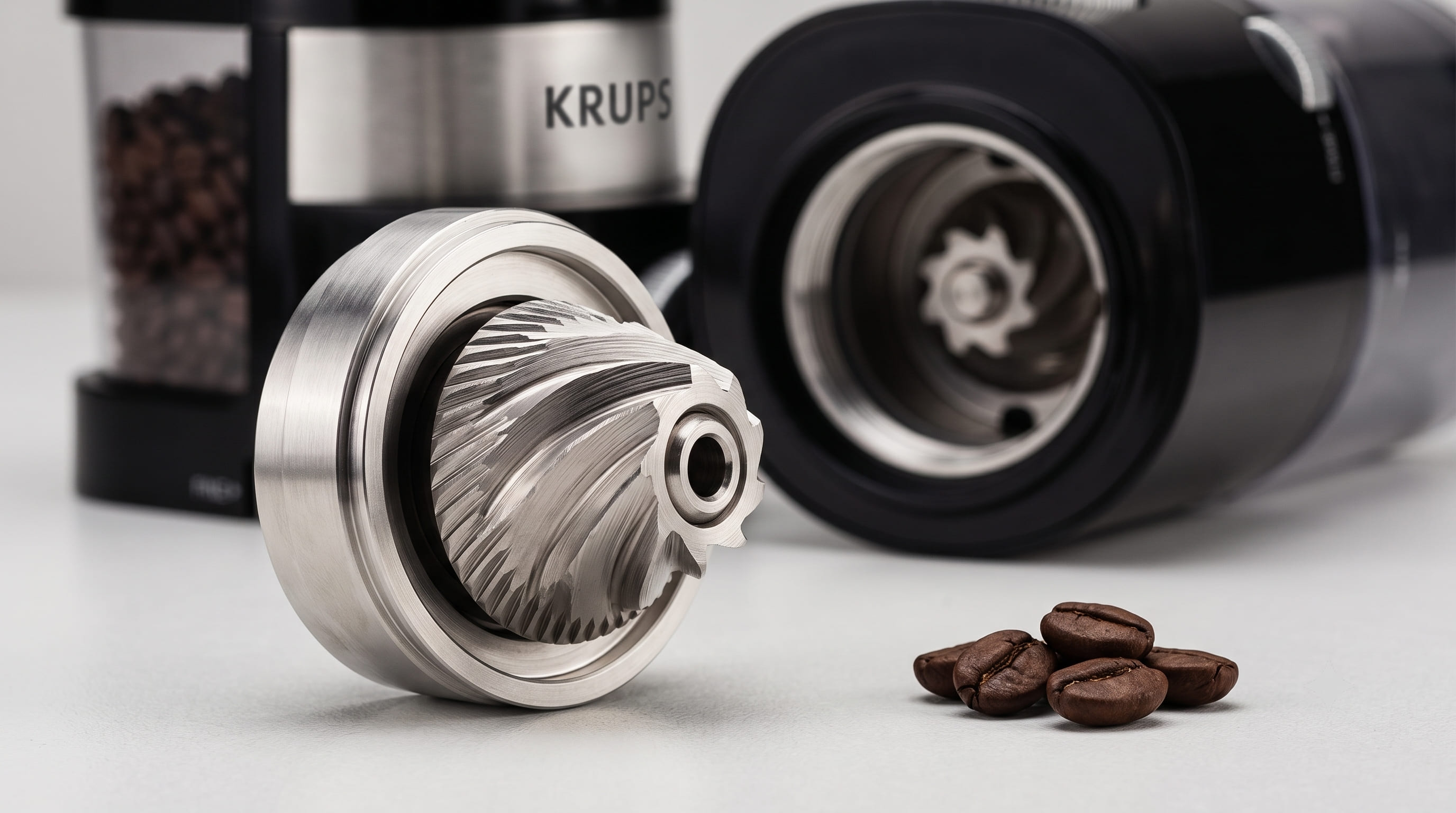 KRUPS Precision Burr Grinder stainless steel conical burr set showing grinding teeth close-up